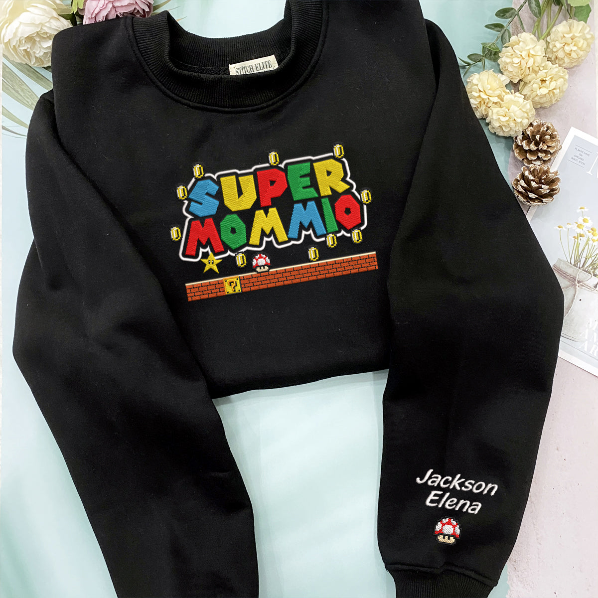 Super Mommio With Kids Name Embroidered Shirt banner1_bd894544-725f-4d62-9f57-e833dfe316fd.jpg