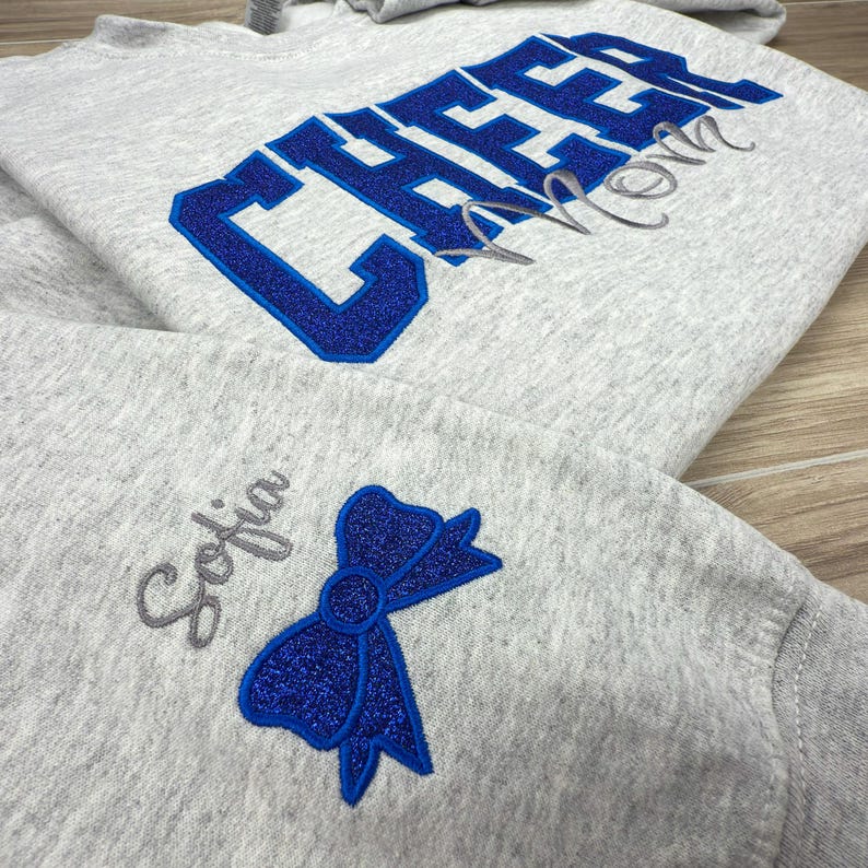 Custom Embroidered Glitter Cheer Mom Sweatshirt | Embroidered with Child's Name | Personalized Cheer Team Spirit | Cheer Mom Gift il_794xN.6619833593_c280.jpg