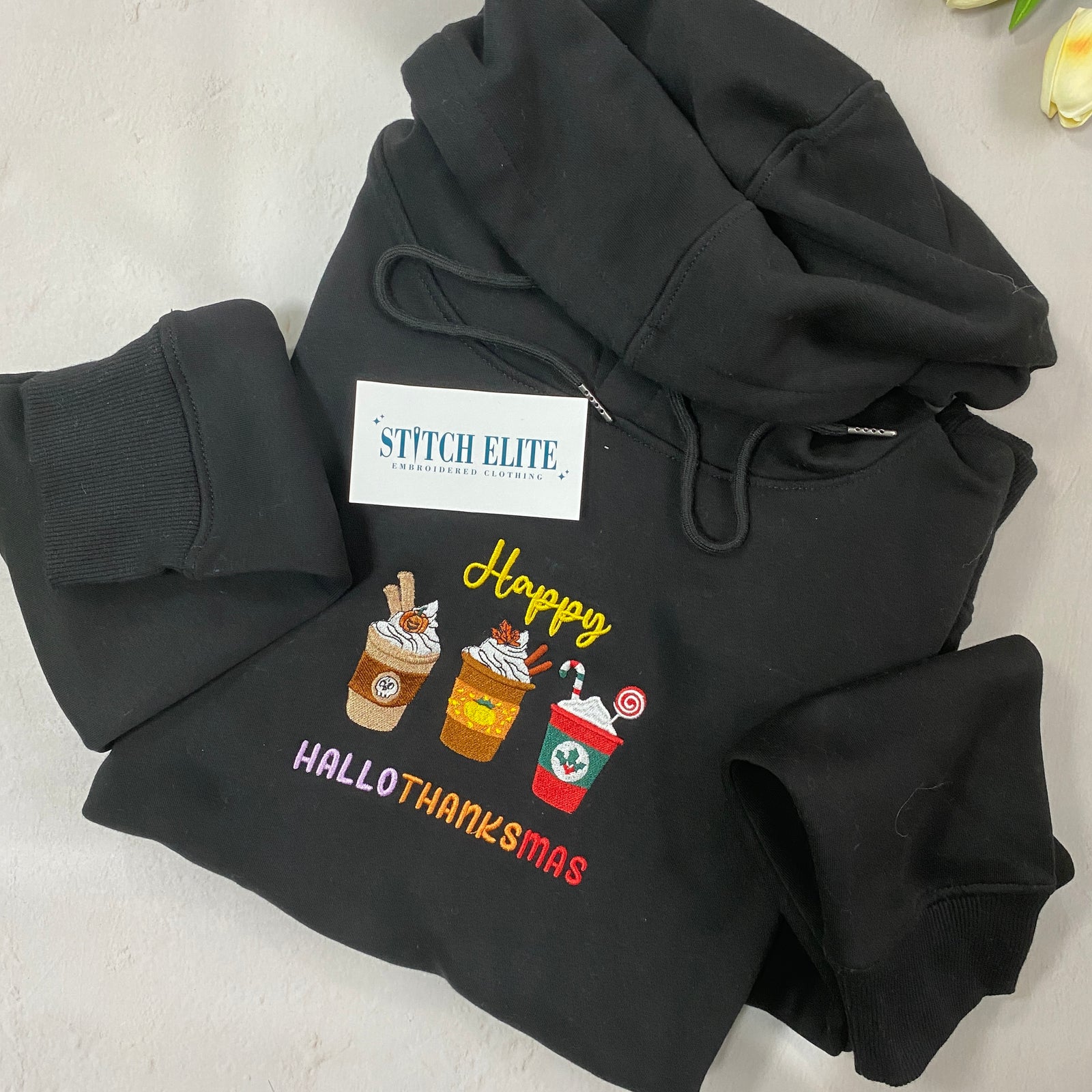 Happy Hallothanksmas Embroidered Hoodie Sweater 1694764003574.jpg