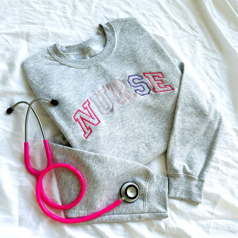 Pink Purple Embroidered Nurse Athletic Block Gemma Sweatshirt Nurse Pullover Sweatshirt Gift For Grad New Nurse Gift Nurse T Shirt 1717821081145.jpg