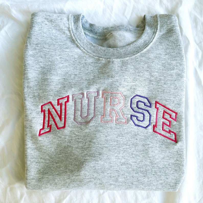 Pink Purple Embroidered Nurse Athletic Block Gemma Sweatshirt Nurse Pullover Sweatshirt Gift For Grad New Nurse Gift Nurse T Shirt 1717821081157.jpg