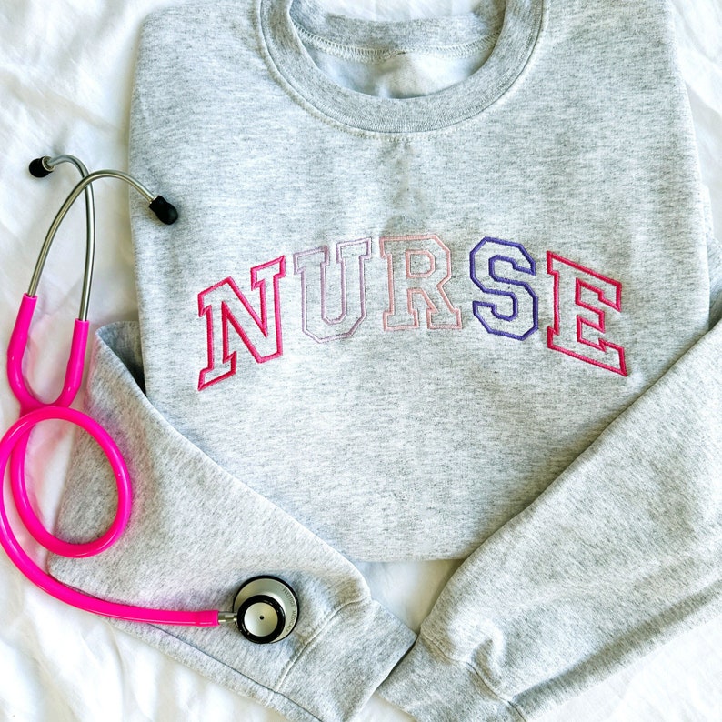 Pink Purple Embroidered Nurse Athletic Block Gemma Sweatshirt Nurse Pullover Sweatshirt Gift For Grad New Nurse Gift Nurse T Shirt 1717821081160.jpg