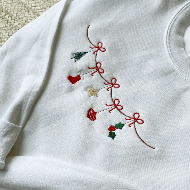 Traditional Christmas Garland Embroidered Sweatshirt  Nostalgic Christmas Crewneck  Festive Holiday Top  Gifts Under 35 1726713862643.jpg