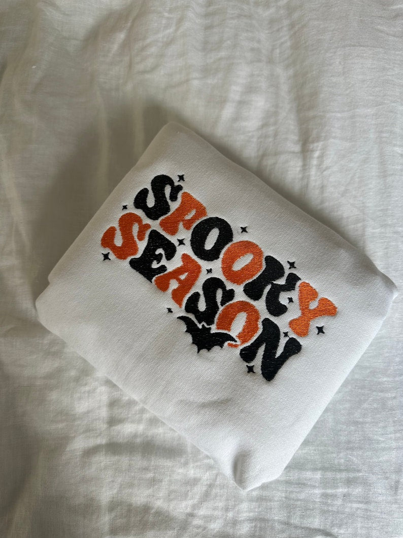 Spooky Season Embroidered Sweatshirt Halloween Embroidered Crewneck Sweatshirt Embroidered Adult Sweatshirt Many Colors 1726720168035.jpg