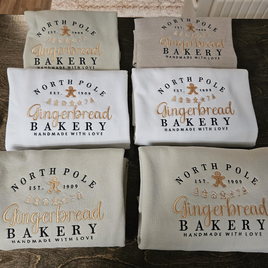North Pole Gingerbread Bakery Handmade With Love Embroidered Sweatshirt 1728371584061.png