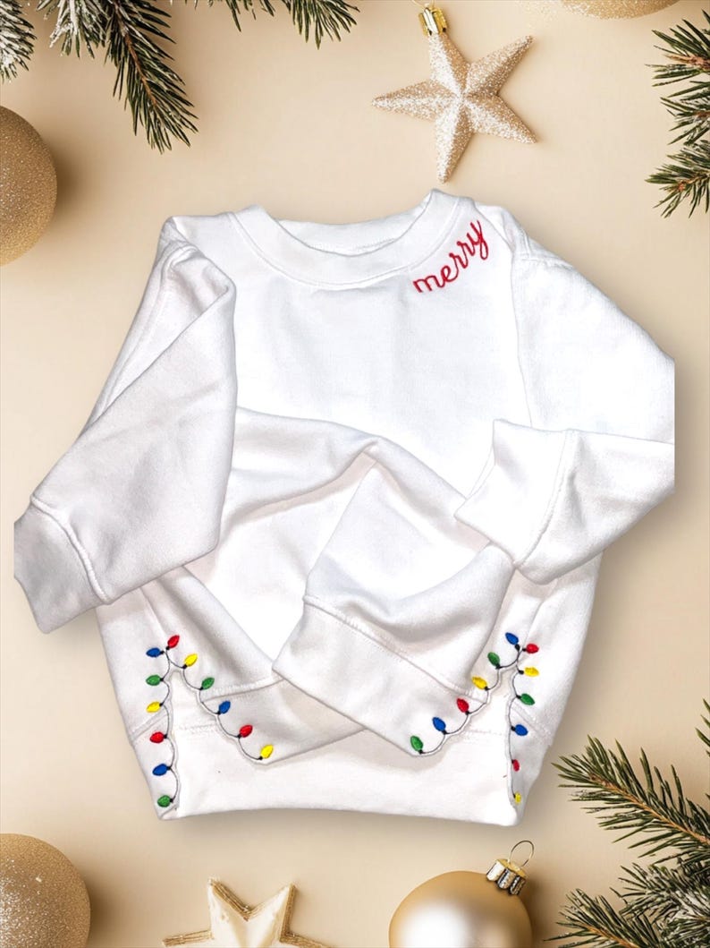 Embroidered Christmas Lights Cut Hem Sweatshirt 1730085796847.jpg