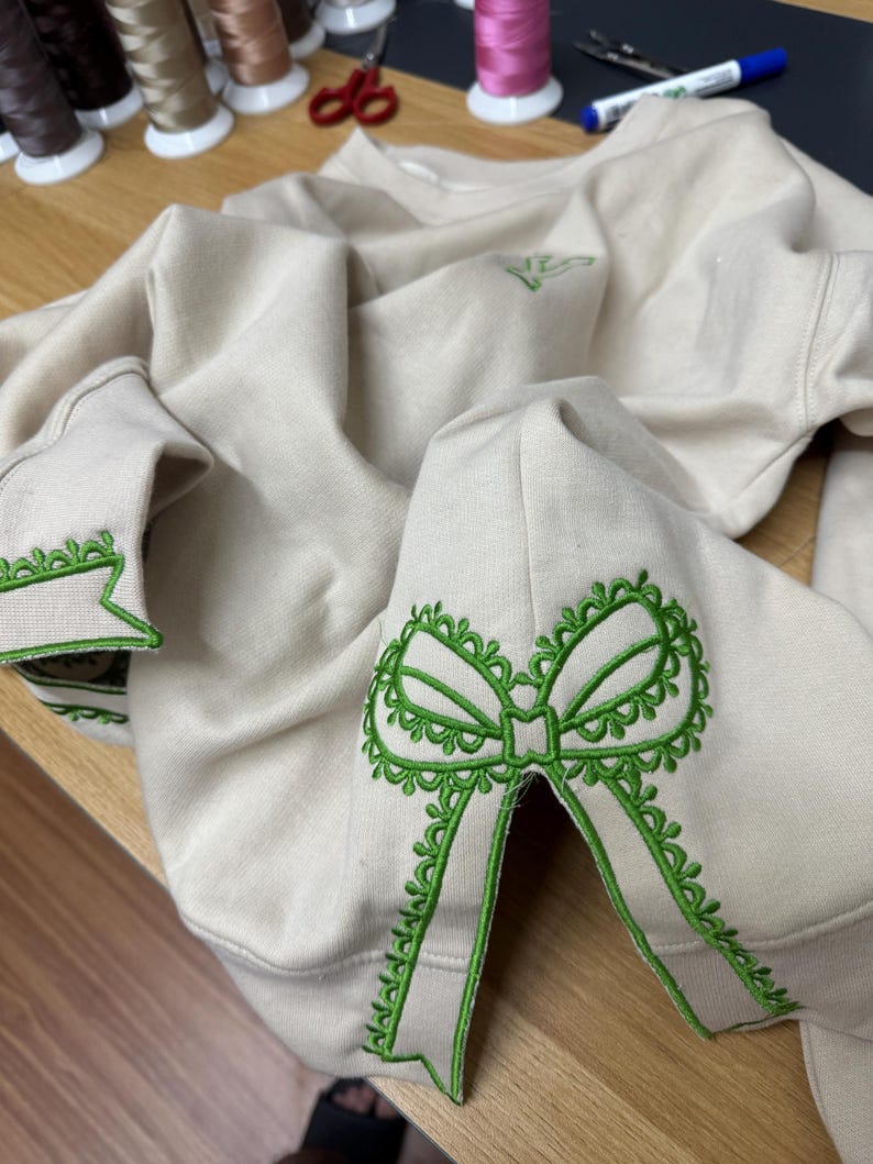 Christmas Embroidered Sweatshirt Merry Side Bow Cut Out Sweatshirt Plaid Christmas Pullover Trendy Coquette Bow Side Bow Sweatshirt 1730088139647.jpg