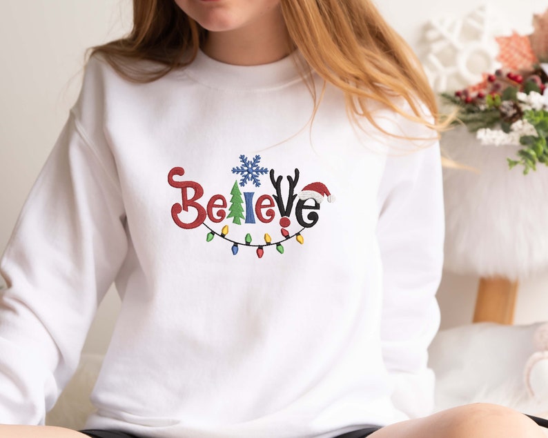 Embroidered Believe Christmas Sweatshirt Embroidered Tis The Season Believe Christmas Tee Merry Christmas Merry And Brightwinter Hoodie 1732071933227.jpg