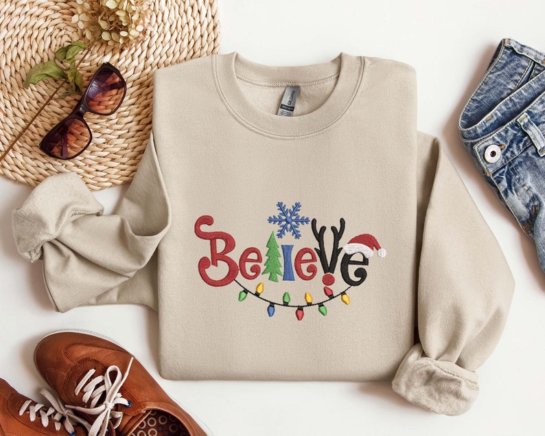 Embroidered Believe Christmas Sweatshirt Embroidered Tis The Season Believe Christmas Tee Merry Christmas Merry And Brightwinter Hoodie 1732071933390.jpg