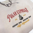 Polar Express Christmas Side Bow Embroidered Sweatshirt Christmas Embroidery Polar Express Crewneck North Pole Christmas Shirt 1732088243768.jpg