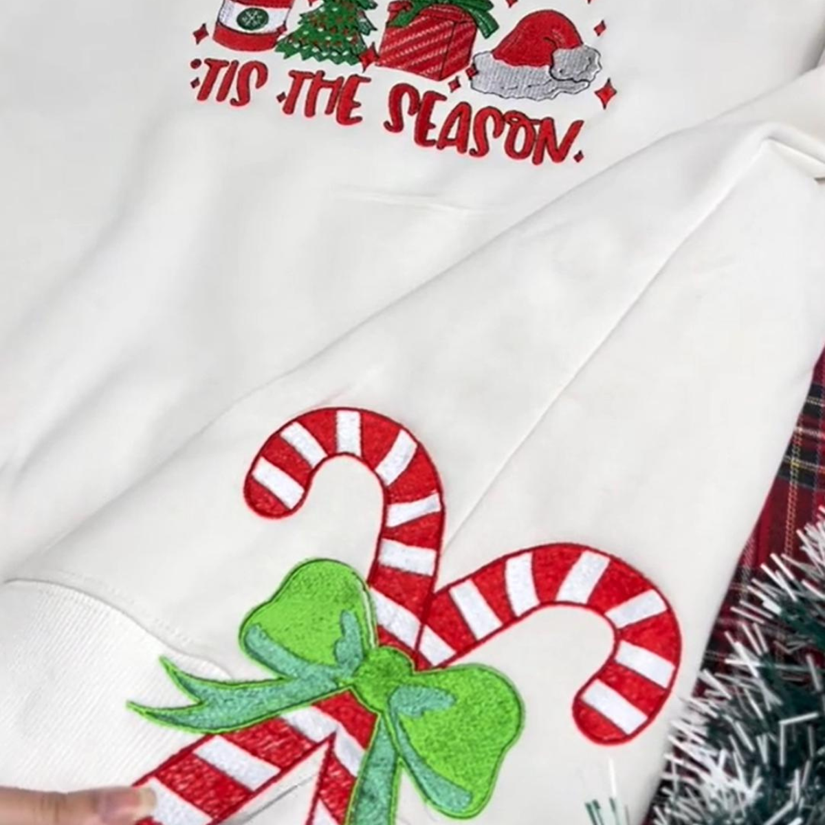 Tis The Season Embroidered Side Bow Glitter Sweatshirt Candy Cane Side Bow Sweatshirt Side Bow Applique Sweatshirt Trendy Coquette Bow 1732336040502.png