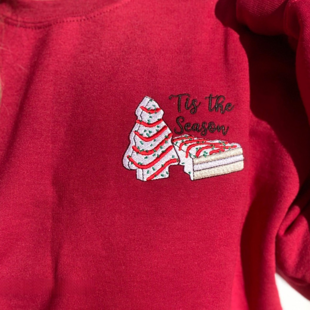 Christmas Tree Cake Embroidered Tis The Season Sweatshirt Embroidered Christmas Crewneck Christmas Tree Cake Snack Cake Christmas Trees 1732518054301.png