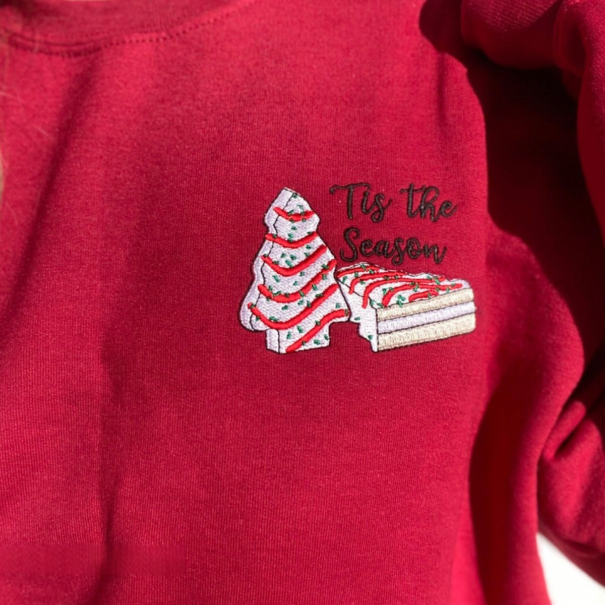 Christmas Tree Cake Embroidered Tis The Season Sweatshirt Embroidered Christmas Crewneck Christmas Tree Cake Snack Cake Christmas Trees 1732518054301.png