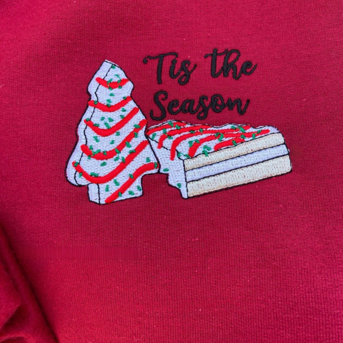 Christmas Tree Cake Embroidered Tis The Season Sweatshirt Embroidered Christmas Crewneck Christmas Tree Cake Snack Cake Christmas Trees 1732518054471.png