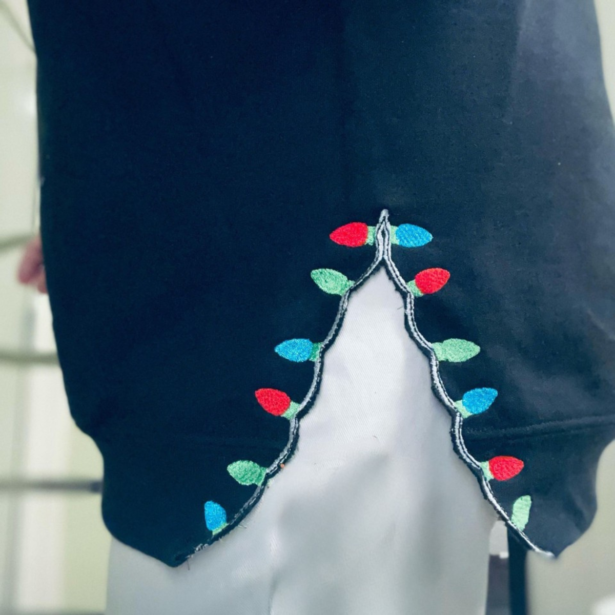 Side Embroidered Sweatshirt With Christmas Lights And Christmas Trees 1732518976213.png