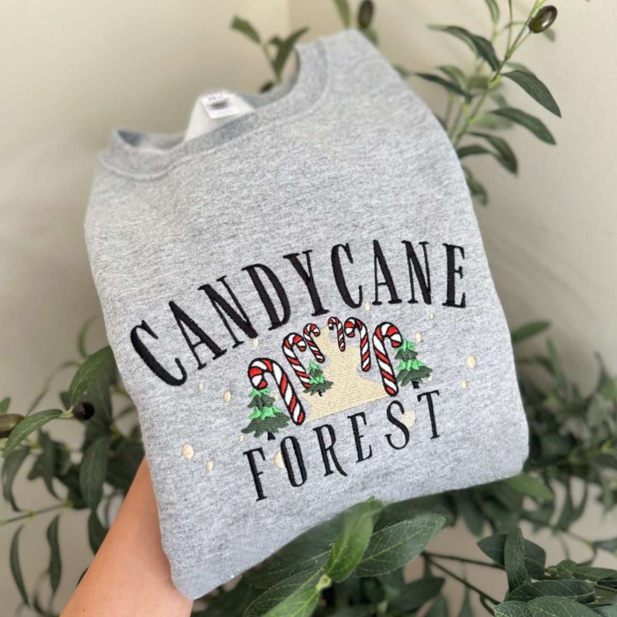 Candy Cane Forest Sweatshirt   Embroidered Elf Inspired Christmas Sweatshirt 1732590179927.png