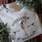 Mistletoe  Mimosas Embroidered Crewneck   Christmas Crewneck Holiday Sweatshirt Mimosas Crewneck Christmas Gift For Christmas 1732592602469.png
