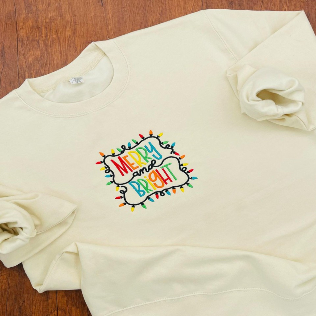 Merry And Bright Embroidered Sweatshirt Holiday Season Crewneck Sweatshirt Lights Christmas Santa Christmas Sweatshirt Holiday Gift 1733212024729.png