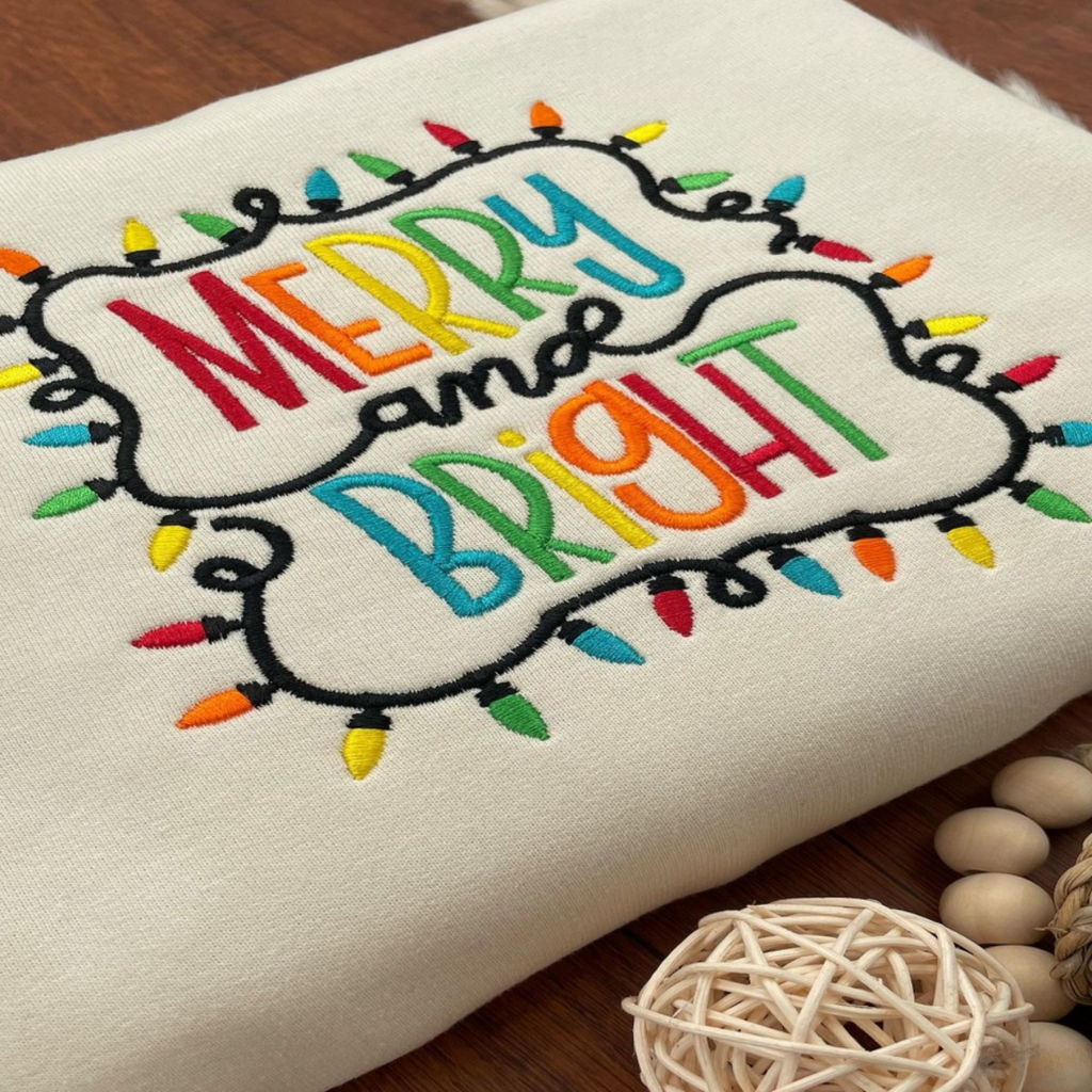Merry And Bright Embroidered Sweatshirt Holiday Season Crewneck Sweatshirt Lights Christmas Santa Christmas Sweatshirt Holiday Gift 1733212025075.png