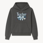 Floral Teacher Design with Apple, Bow & Stationery - Perfect Gift for Educators, Teachers' Day, Classroom Decor, Cute Art Print - Hoodie 1758093373642.jpg