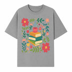Whimsical Book Stack with Coffee and Flowers Art Print - Cozy Reading Decor for Home or Office - T-shirt 1758093373993.jpg