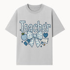 Floral Teacher Design with Apple, Bow & Stationery - Perfect Gift for Educators, Teachers' Day, Classroom Decor, Cute Art Print - T-shirt 1758093376889.jpg