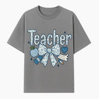 Floral Teacher Design with Apple, Bow & Stationery - Perfect Gift for Educators, Teachers' Day, Classroom Decor, Cute Art Print - T-shirt 1758093377585.jpg
