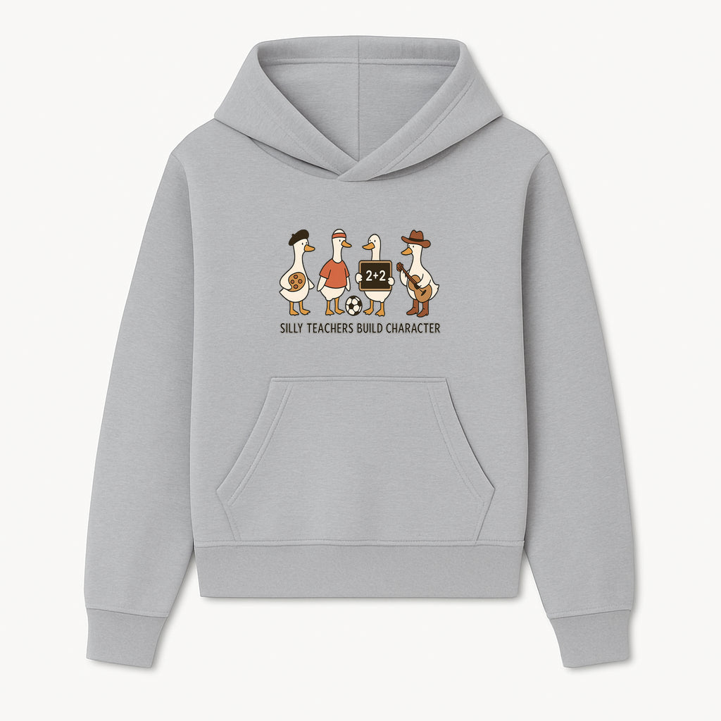 Silly Teachers Build Character Ducks Graphic Tee for Kids Fun Classroom Humor Shirt with Soccer, Music, and Learning Themes - Hoodie 1758093379824.jpg