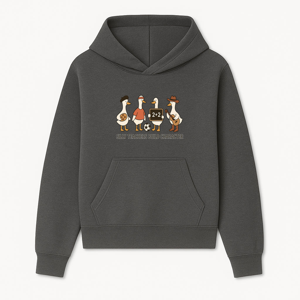 Silly Teachers Build Character Ducks Graphic Tee for Kids Fun Classroom Humor Shirt with Soccer, Music, and Learning Themes - Hoodie 1758093380239.jpg