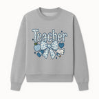 Floral Teacher Design with Apple, Bow & Stationery - Perfect Gift for Educators, Teachers' Day, Classroom Decor, Cute Art Print - Sweatshirt 1758093380607.jpg