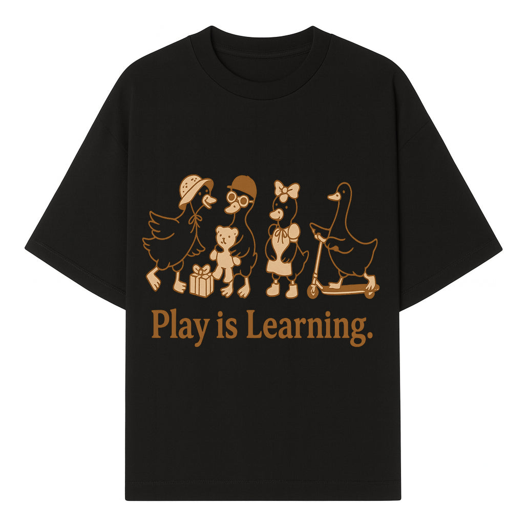 Play is Learning: Cute Cartoon Ducks with Gifts and Toys for Kids' Educational Decor - T-shirt 1758093381517.jpg