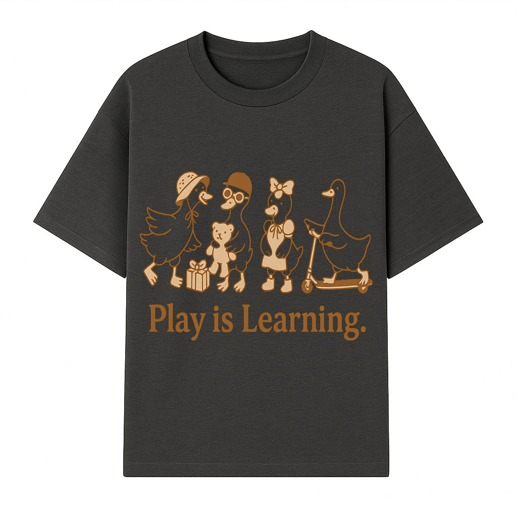 Play is Learning: Cute Cartoon Ducks with Gifts and Toys for Kids' Educational Decor - T-shirt 1758093381678.jpg