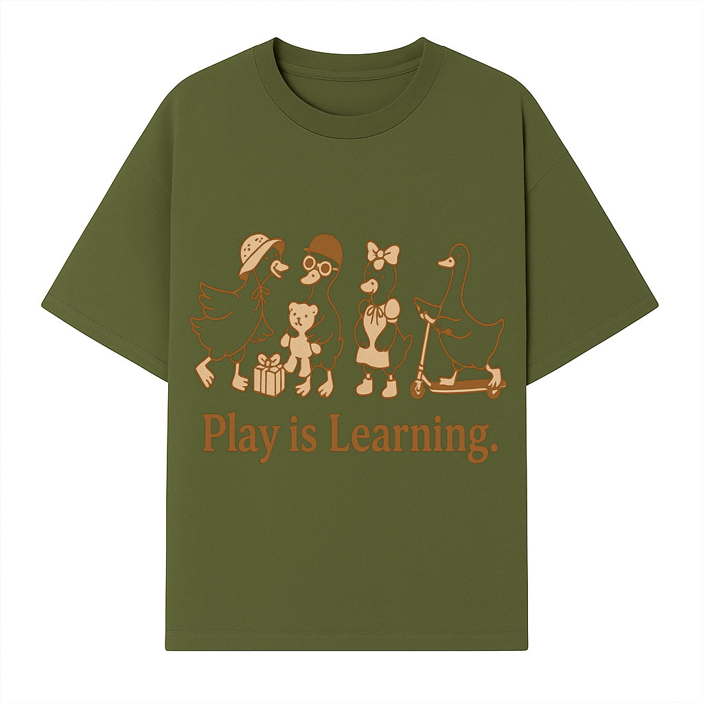 Play is Learning: Cute Cartoon Ducks with Gifts and Toys for Kids' Educational Decor - T-shirt 1758093381852.jpg
