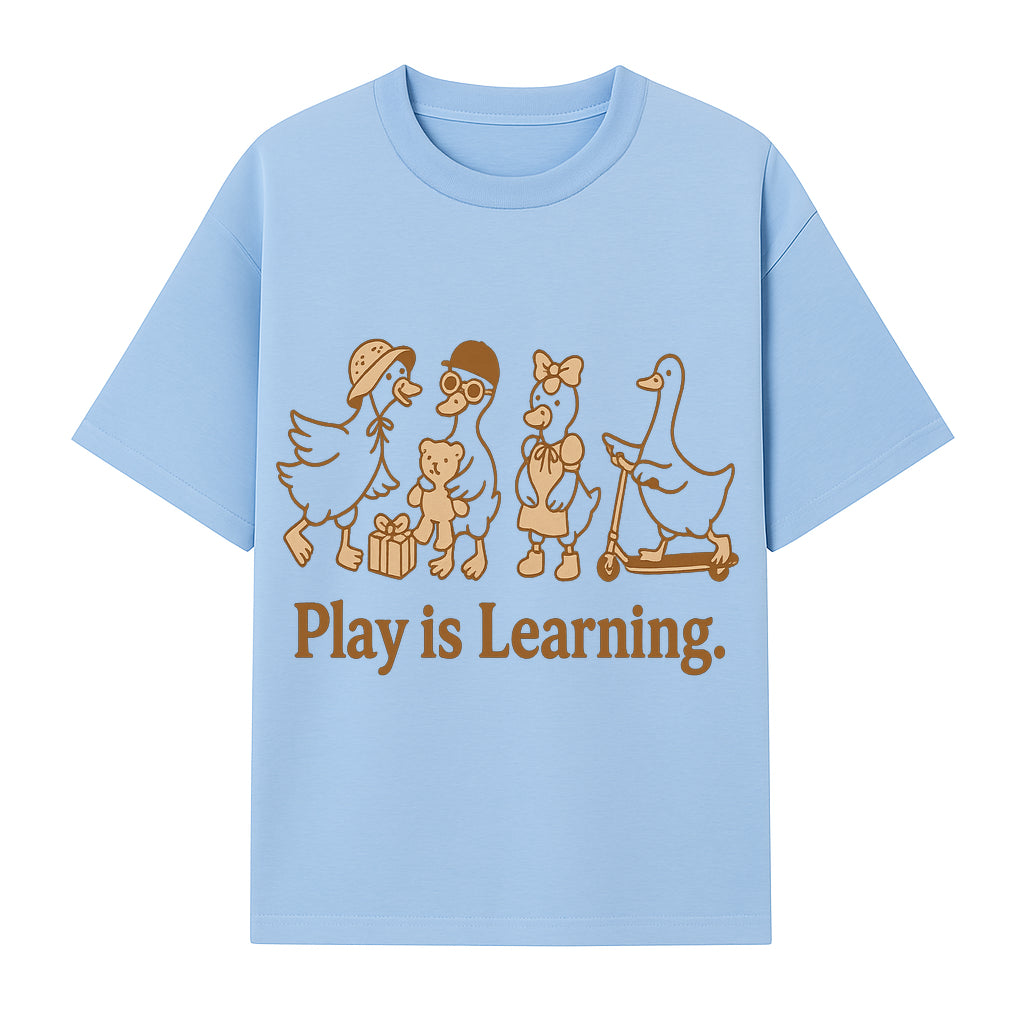 Play is Learning: Cute Cartoon Ducks with Gifts and Toys for Kids' Educational Decor - T-shirt 1758093382188.jpg