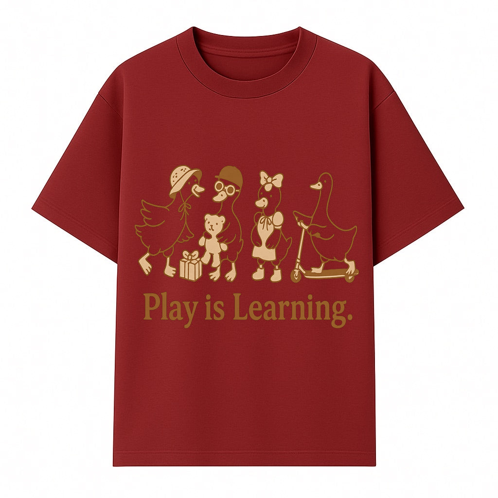 Play is Learning: Cute Cartoon Ducks with Gifts and Toys for Kids' Educational Decor - T-shirt 1758093382527.jpg