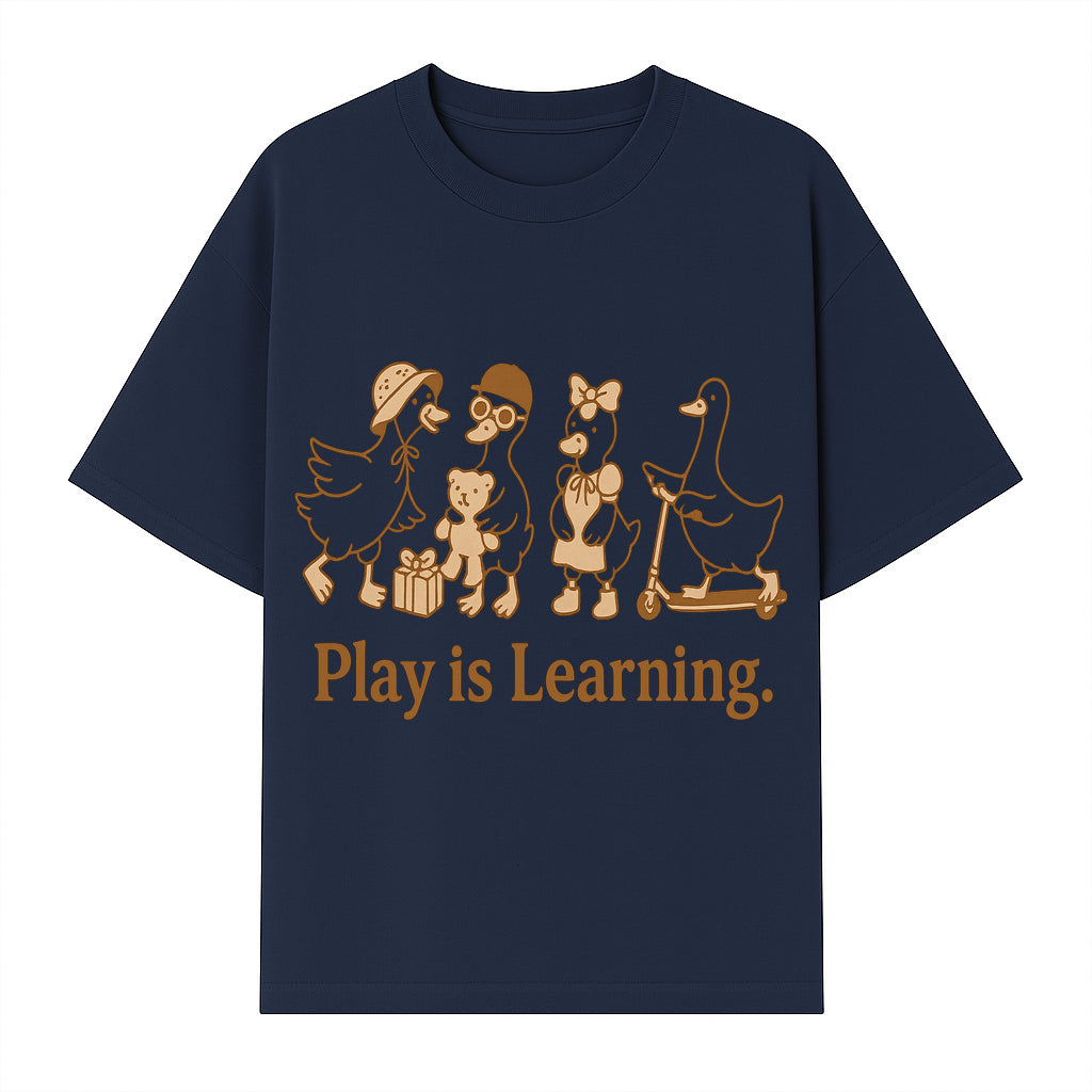 Play is Learning: Cute Cartoon Ducks with Gifts and Toys for Kids' Educational Decor - T-shirt 1758093382662.jpg