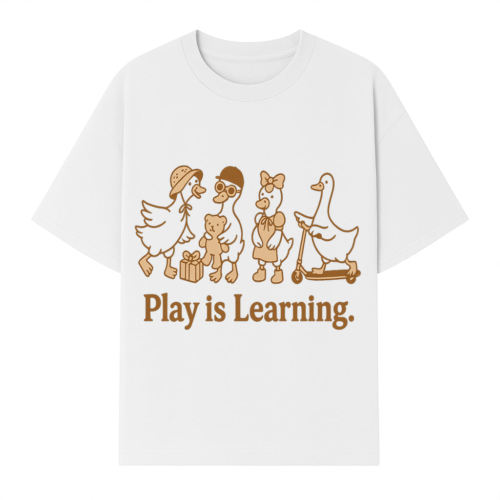 Play is Learning: Cute Cartoon Ducks with Gifts and Toys for Kids' Educational Decor - T-shirt 1758093383161.jpg