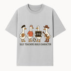 Silly Teachers Build Character Ducks Graphic Tee for Kids Fun Classroom Humor Shirt with Soccer, Music, and Learning Themes - T-shirt 1758093383471.jpg