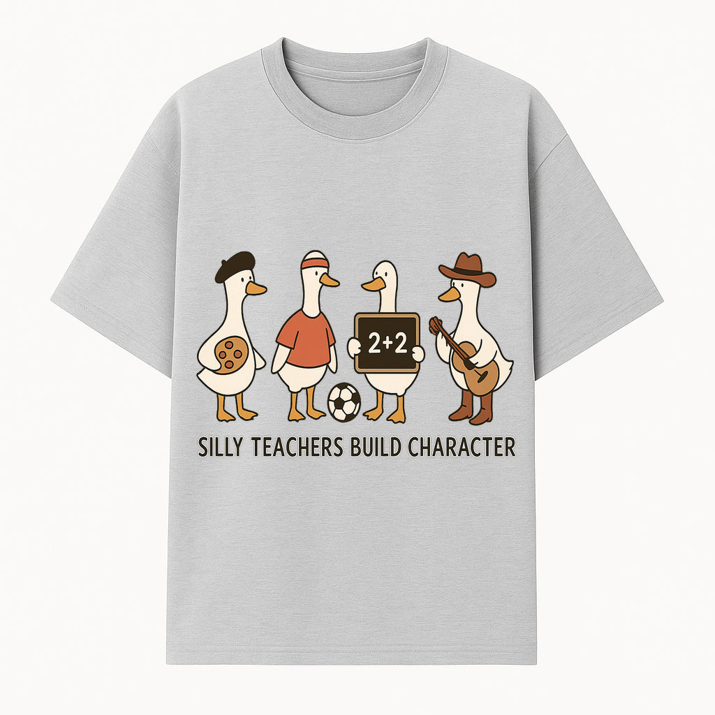 Silly Teachers Build Character Ducks Graphic Tee for Kids Fun Classroom Humor Shirt with Soccer, Music, and Learning Themes - T-shirt 1758093383471.jpg