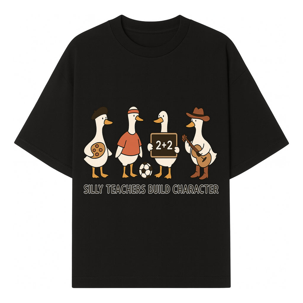 Silly Teachers Build Character Ducks Graphic Tee for Kids Fun Classroom Humor Shirt with Soccer, Music, and Learning Themes - T-shirt 1758093383681.jpg