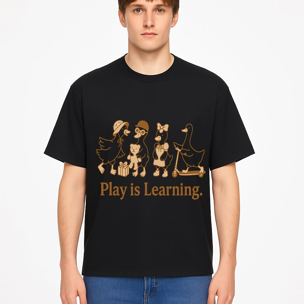 Play is Learning: Cute Cartoon Ducks with Gifts and Toys for Kids' Educational Decor - T-shirt 1758093384317.jpg