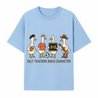 Silly Teachers Build Character Ducks Graphic Tee for Kids Fun Classroom Humor Shirt with Soccer, Music, and Learning Themes - T-shirt 1758093384347.jpg