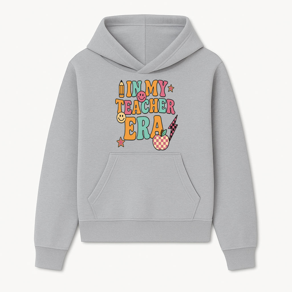 In My Teacher Era Graphic Tee - Retro Style with Happy Faces and School Elements, Perfect for Educators - Hoodie 1758093385147.jpg