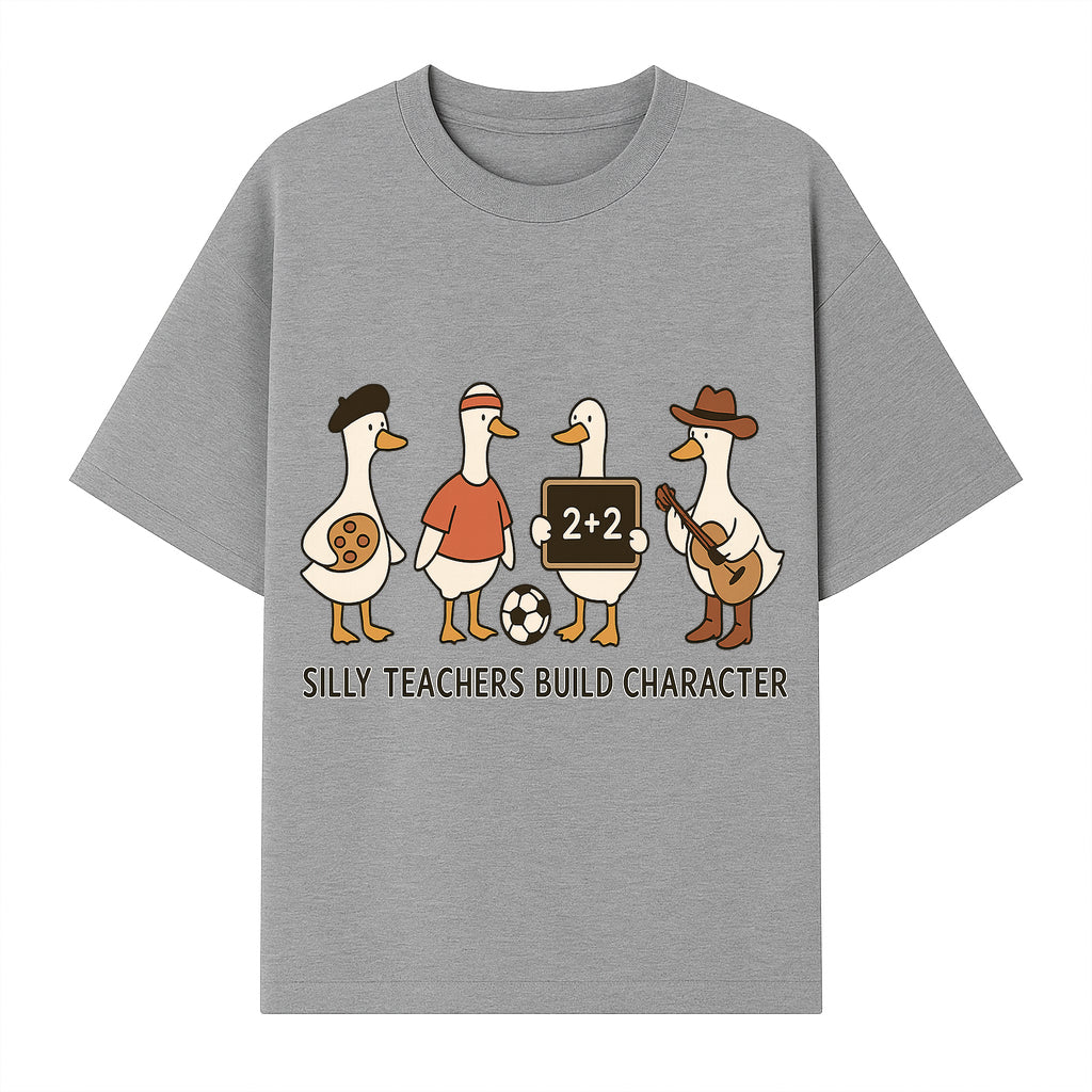 Silly Teachers Build Character Ducks Graphic Tee for Kids Fun Classroom Humor Shirt with Soccer, Music, and Learning Themes - T-shirt 1758093385163.jpg
