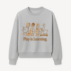 Play is Learning: Cute Cartoon Ducks with Gifts and Toys for Kids' Educational Decor - Sweatshirt 1758093385276.jpg