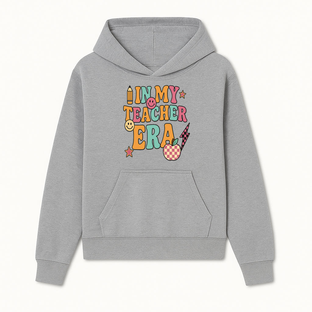In My Teacher Era Graphic Tee - Retro Style with Happy Faces and School Elements, Perfect for Educators - Hoodie 1758093385877.jpg