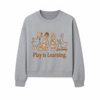 Play is Learning: Cute Cartoon Ducks with Gifts and Toys for Kids' Educational Decor - Sweatshirt 1758093386340.jpg