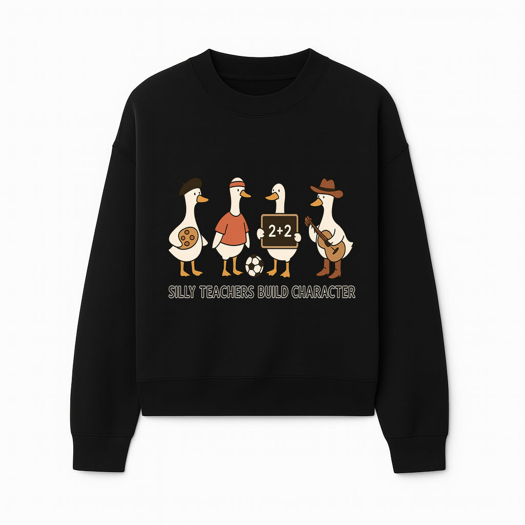 Silly Teachers Build Character Ducks Graphic Tee for Kids Fun Classroom Humor Shirt with Soccer, Music, and Learning Themes - Sweatshirt 1758093387018.jpg