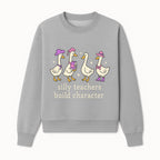 Silly Teachers Build Character - Cute Duck Illustration, Educational Gift, Fun Classroom Decor, Teacher Appreciation, Kids Learning - Sweatshirt 1758093387250.jpg