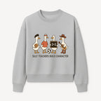 Silly Teachers Build Character Ducks Graphic Tee for Kids Fun Classroom Humor Shirt with Soccer, Music, and Learning Themes - Sweatshirt 1758093387477.jpg